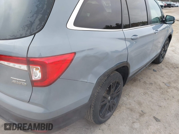 2022 Honda Pilot Special Edition with VIN 5FNYF6H22NB063328, listed as a IAAI auction lot 41773094 with 40,219 mi miles and . Bid and sale history available at DreamBid. Image 6.