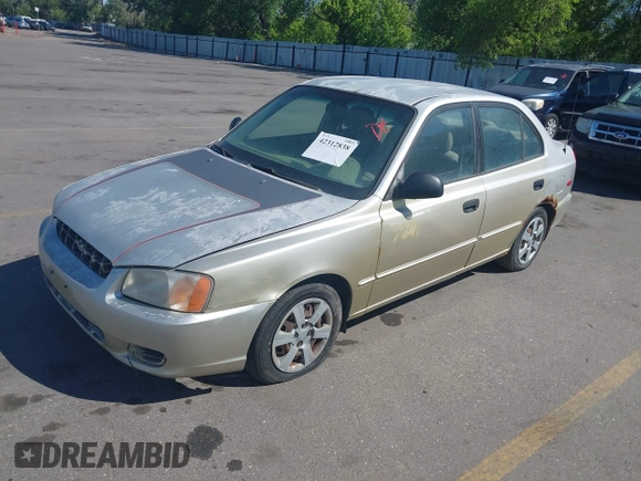 2002 Hyundai Accent GL z VIN KMHCG45C62U336245, wystawiony jako IAAI lot #42312838 z przebiegiem 310 753 mil mil oraz . Historia ofert i sprzedaży dostępna na DreamBid. Obrazek 2.