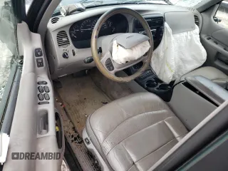 1998 Ford Explorer XLT with VIN 1FMZU32P8WZA91509, listed as a Copart auction lot 65531174 with 127,182 mi miles and Salvage title. Bid and sale history available at DreamBid. Image 8.