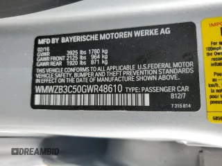 2016 MINI Countryman with VIN WMWZB3C50GWR48610, listed as a Copart auction lot 44028035 with 69,801 mi miles and Salvage title. Bid and sale history available at DreamBid. Image 14.