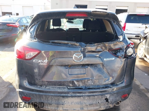 2016 Mazda CX-5 Touring with VIN JM3KE4CY0G0751040, listed as a IAAI auction lot 41290780 with 136,689 mi miles. Bid and sale history available at carsss.com. Image 17.