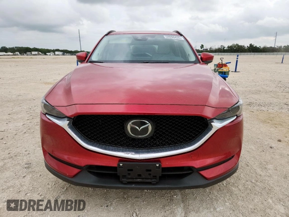 2018 Mazda CX-5 Grand Touring with VIN JM3KFADM8J0451535, listed as a Copart auction lot 59990435 with 77,163 mi miles and Salvage title. Bid and sale history available at DreamBid. Image 5.