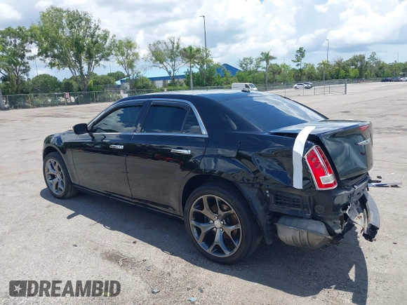 2014 Chrysler 300 C with VIN 2C3CCAKT9EH171614, listed as a IAAI auction lot 39747704 with 129,156 mi miles and . Bid and sale history available at carsss.com. Image 14.