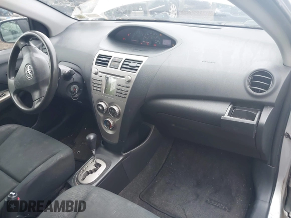 2009 Toyota Yaris with VIN JTDBT903494047486, listed as a IAAI auction lot 42173242 with 145,225 mi miles. Bid and sale history available at carsss.com. Image 5.
