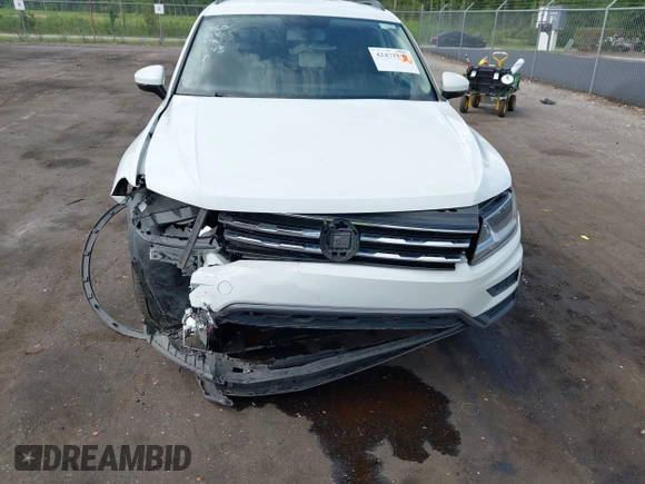 2021 Volkswagen Tiguan SE z VIN 3VV2B7AX5MM057743, wystawiony jako IAAI lot #42471192 z przebiegiem 80 133 mil mil oraz . Historia ofert i sprzedaży dostępna na DreamBid. Obrazek 6.