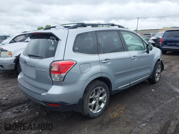 2018 Subaru Forester Touring with VIN JF2SJAWC6JH496875, listed as a IAAI auction lot 42347532 with 70,978 mi miles and . Bid and sale history available at DreamBid. Image 4.
