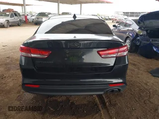 2016 Kia Optima LX with VIN KNAGT4L32G5111503, listed as a IAAI auction lot 42011975 with 114,476 mi miles. Bid and sale history available at carsss.com. Image 16.