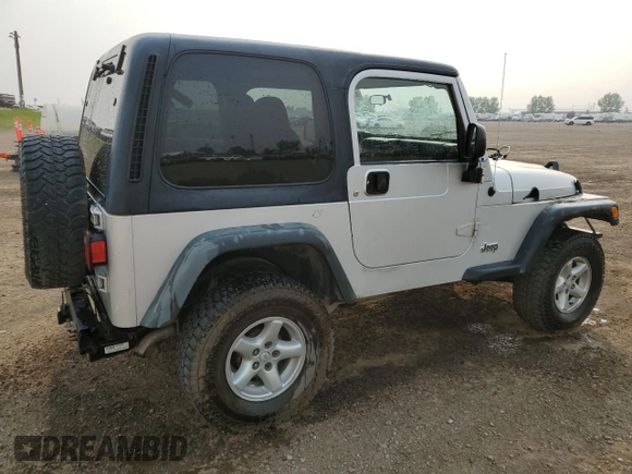 2003 Jeep Wrangler Sport z VIN 1J4FA49S93P306817, wystawiony jako Copart lot #60136385 z przebiegiem 217 208 mil mil oraz Czysty tytuł • Clean title. Historia ofert i sprzedaży dostępna na DreamBid. Obrazek 3.