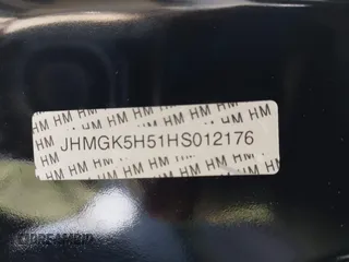 2017 Honda Fit LX with VIN JHMGK5H51HS012176, listed as a IAAI auction lot 42011477 with 91,894 mi miles. Bid and sale history available at carsss.com. Image 9.