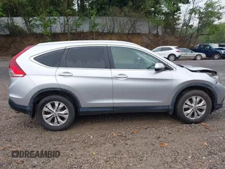 2013 Honda CR-V EX-L with VIN 2HKRM4H73DH618328, listed as a IAAI auction lot 42647497 with 200,667 mi miles and . Bid and sale history available at DreamBid. Image 14.