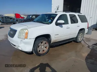 2011 GMC Yukon SLT with VIN 1GKS2CE03BR397395, listed as a IAAI auction lot 41813501 with 220,443 mi miles. Bid and sale history available at carsss.com. Image 17.