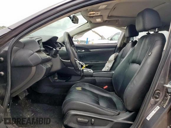 2018 Honda Civic EX-L z VIN JHMFC1F73JX013862, wystawiony jako Copart lot #58811855 z przebiegiem 104 926 mil mil oraz Szkoda całkowita • Salvage title. Historia ofert i sprzedaży dostępna na DreamBid. Obrazek 7.