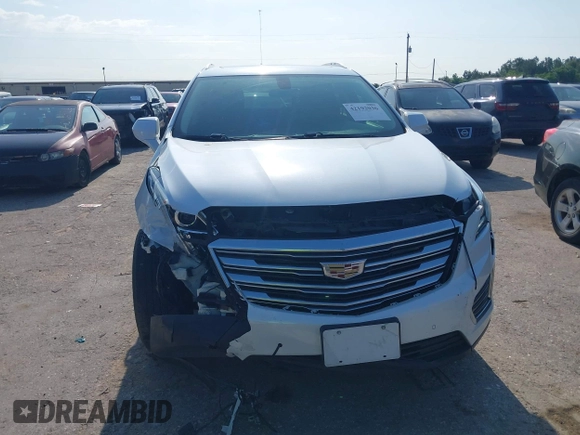 2018 Cadillac XT5 Luxury FWD with VIN 1GYKNCRS2JZ174756, listed as a IAAI auction lot 42192036 with 63,684 mi miles and . Bid and sale history available at carsss.com. Image 12.