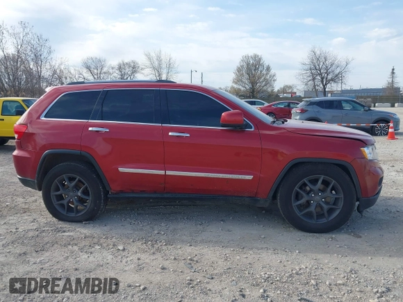 2011 Jeep Grand Cherokee Laredo with VIN 1J4RR4GG6BC527897, listed as a IAAI auction lot 42032975 with 148,875 mi miles. Bid and sale history available at carsss.com. Image 14.