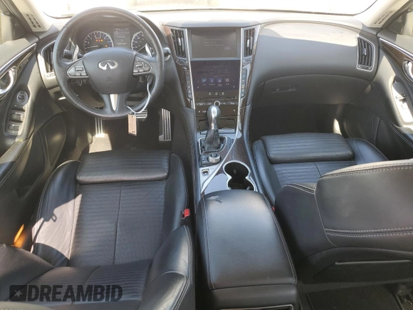 2016 Infiniti Q50 with VIN JN1EV7AR0GM340154, listed as a Copart auction lot 52594835 with 80,309 mi miles and Salvage Title. Bid and sale history available at DreamBid. Image 8.