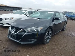 2018 Nissan Maxima S with VIN 1N4AA6AP4JC377761, listed as a IAAI auction lot 41742827 with 115,242 mi miles and . Bid and sale history available at DreamBid. Image 2.