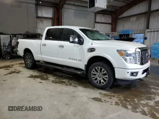 2017 Nissan Titan Pro-4X with VIN 1N6BA1F46HN574314, listed as a Copart auction lot 55573985 with 98,812 mi miles and Salvage title. Bid and sale history available at DreamBid. Image 4.