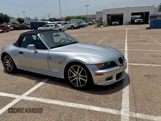 1998 BMW 3 Series Z3 2.8 with VIN 4USCJ3331WLC15621, listed as a Copart auction lot 65608095 with 104,384 mi miles and Clean title. Bid and sale history available at DreamBid. Image 1.