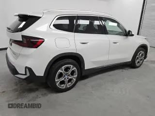 2023 BMW X1 xDrive28i with VIN WBX73EF00P5X20800, listed as a Copart auction lot 53166625 with 27,545 mi miles and Clean Title. Bid and sale history available at carsss.com. Image 3.