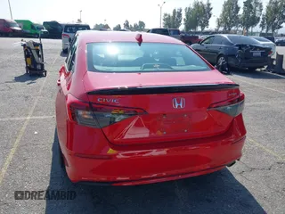 2023 Honda Civic Sport z VIN 2HGFE2F54PH559259, wystawiony jako IAAI lot #42201601 z przebiegiem 42 807 mil mil oraz . Historia ofert i sprzedaży dostępna na DreamBid. Obrazek 17.