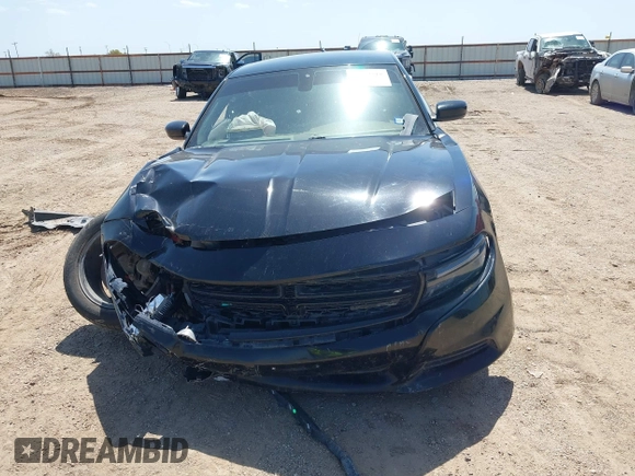 2017 Dodge Charger SXT with VIN 2C3CDXHG0HH571849, listed as a IAAI auction lot 42012518 with 104,586 mi miles and . Bid and sale history available at carsss.com. Image 12.