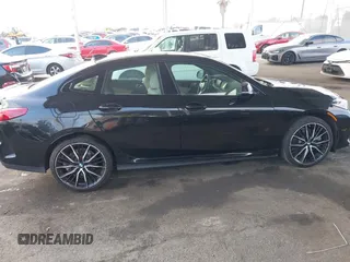2022 BMW 2 Series 228i xDrive with VIN WBA73AK0XN7K87285, listed as a IAAI auction lot 41194510 with 23,099 mi miles. Bid and sale history available at carsss.com. Image 13.