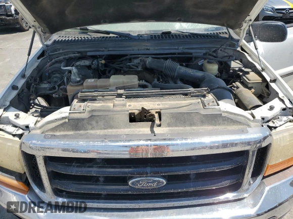 1999 Ford F-250 XL with VIN 1FTNX20L8XEB01923, listed as a Copart auction lot 65404495 with 383,297 mi miles and Salvage title. Bid and sale history available at DreamBid. Image 11.