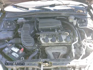 2003 Honda Civic LX with VIN 1HGEM21513L062947, listed as a IAAI auction lot 42208347 with 263,078 mi miles and . Bid and sale history available at DreamBid. Image 10.