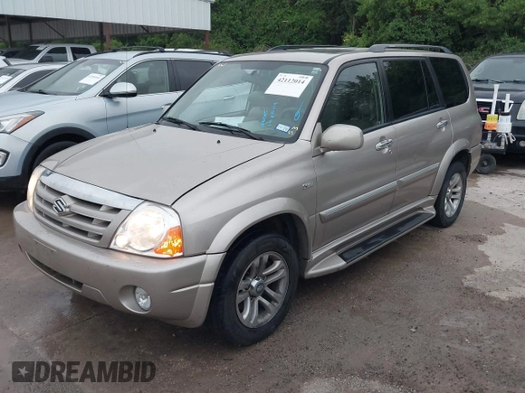 2004 Suzuki XL-7 LX with VIN JS3TX92V244114426, listed as a IAAI auction lot 42112014 with 169,377 mi miles. Bid and sale history available at carsss.com. Image 2.