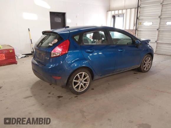 2019 Ford Fiesta SE with VIN 3FADP4EJ6KM124270, listed as a IAAI auction lot 40962134 with 122,757 mi miles. Bid and sale history available at carsss.com. Image 4.