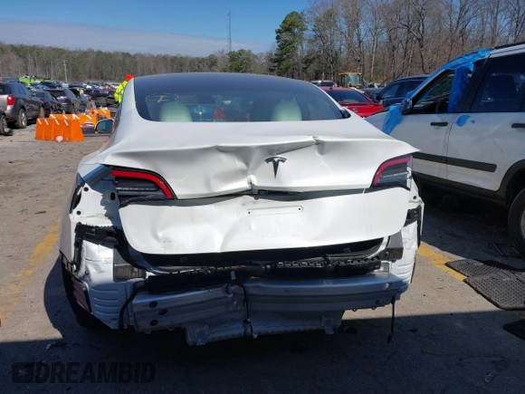 2022 Tesla Model 3 with VIN 5YJ3E1EA7NF103513, listed as a IAAI auction lot 41643592 with 35,631 mi miles and . Bid and sale history available at DreamBid. Image 16.