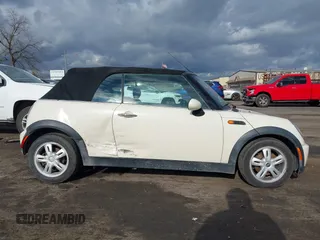 2006 MINI Convertible with VIN WMWRF33566TF65410, listed as a IAAI auction lot 40813052 with 131,109 mi miles and . Bid and sale history available at DreamBid. Image 13.