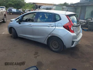 2015 Honda Fit LX with VIN 3HGGK5H58FM727710, listed as a IAAI auction lot 42208290 with 121,552 mi miles. Bid and sale history available at carsss.com. Image 3.
