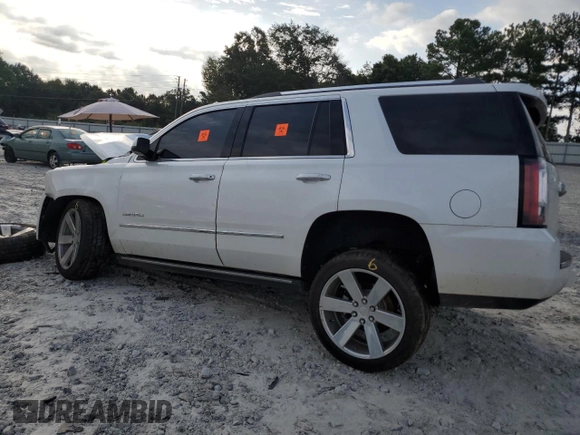 2016 GMC Yukon Denali with VIN 1GKS1CKJ5GR276276, listed as a Copart auction lot 68343954 with Not Provided miles and Salvage Title. Bid and sale history available at DreamBid. Image 2.