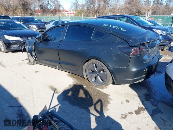 2020 Tesla Model 3 Standard Range Plus with VIN 5YJ3E1EA4LF745491, listed as a IAAI auction lot 41186726 with 74,575 mi miles and . Bid and sale history available at DreamBid. Image 3.
