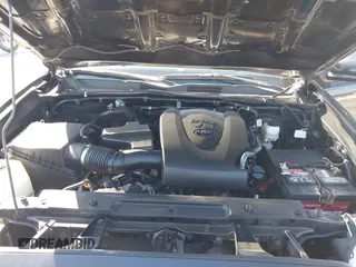 2018 Toyota Tacoma SR with VIN 3TMCZ5AN2JM127244, listed as a IAAI auction lot 41698199 with 61,535 mi miles and . Bid and sale history available at DreamBid. Image 10.