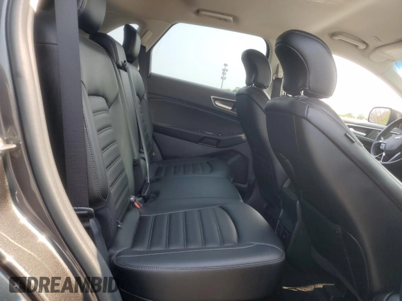 2019 Ford Edge SEL z VIN 2FMPK4J9XKBC67141, wystawiony jako Copart lot #60271615 z przebiegiem 100 400 mil mil oraz Szkoda całkowita • Salvage title. Historia ofert i sprzedaży dostępna na DreamBid. Obrazek 11.