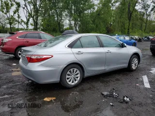 2015 Toyota Camry XLE z VIN 4T4BF1FK7FR460099, wystawiony jako Copart lot #57674195 z przebiegiem 162 774 mil mil oraz Szkoda całkowita • Salvage title. Historia ofert i sprzedaży dostępna na DreamBid. Obrazek 3.