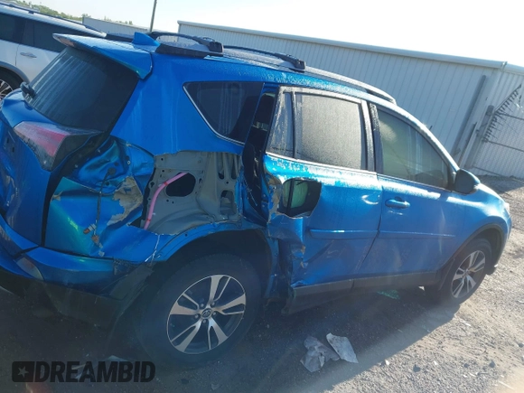 2018 Toyota RAV4 XLE with VIN JTMWFREV1JJ736877, listed as a IAAI auction lot 42072222 with 43,004 mi miles and . Bid and sale history available at carsss.com. Image 14.