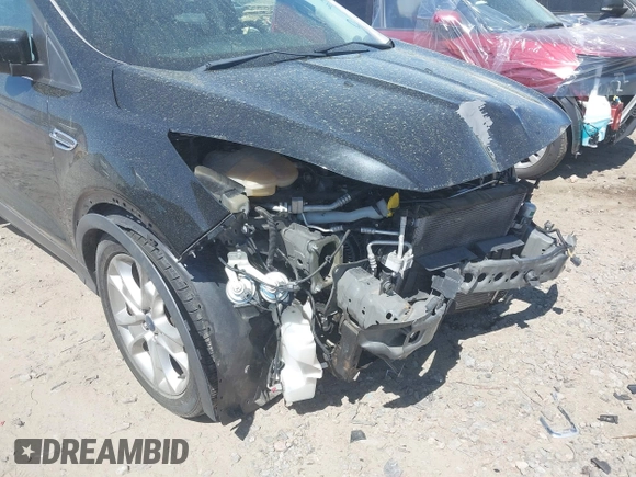 2015 Ford Escape Titanium with VIN 1FMCU0J91FUB36973, listed as a IAAI auction lot 41889560 with 93,445 mi miles and . Bid and sale history available at DreamBid. Image 16.
