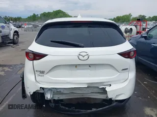 2018 Mazda CX-5 Touring with VIN JM3KFBCMXJ0366008, listed as a IAAI auction lot 42079989 with 153,868 mi miles and . Bid and sale history available at DreamBid. Image 16.