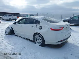 2014 Ford Fusion SE Hybrid with VIN 3FA6P0LU8ER192043, listed as a IAAI auction lot 41617422 with 131,772 mi miles. Bid and sale history available at carsss.com. Image 3.