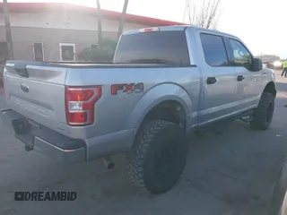 2019 Ford F-150 XL with VIN 1FTEW1E43KKE23264, listed as a IAAI auction lot 41395865 with 106,898 mi miles. Bid and sale history available at carsss.com. Image 4.