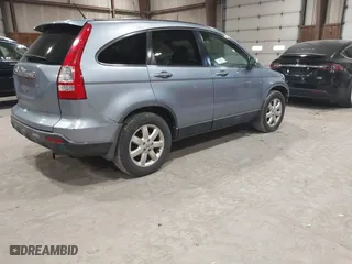 2007 Honda CR-V EX-L with VIN JHLRE48747C093649, listed as a IAAI auction lot 42086953 with 116,996 mi miles. Bid and sale history available at carsss.com. Image 4.