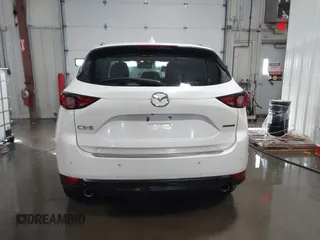 2021 Mazda CX-5 Grand Touring with VIN JM3KFADM3M0312143, listed as a IAAI auction lot 41606582 with 46,515 mi miles. Bid and sale history available at carsss.com. Image 16.
