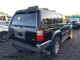 1998 Toyota 4Runner Limited with VIN JT3HN87RXW0188465, listed as a IAAI auction lot 41372608 with 253,778 mi miles. Bid and sale history available at carsss.com. Image 4.