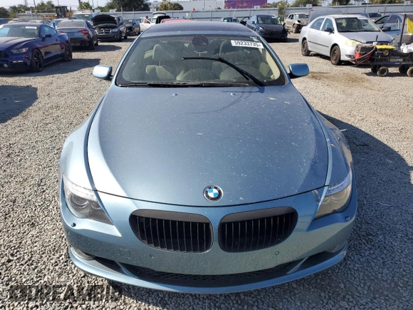2009 BMW 6 Series 650i z VIN WBAEA535X9CV92748, wystawiony jako Copart lot #59233735 z przebiegiem 116 797 mil mil oraz Czysty tytuł • Clean title. Historia ofert i sprzedaży dostępna na DreamBid. Obrazek 5.