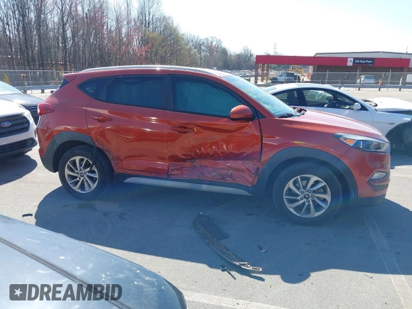 2017 Hyundai Tucson SE z VIN KM8J33A48HU396127, wystawiony jako IAAI lot #41785992 z przebiegiem 86 667 mil mil oraz . Historia ofert i sprzedaży dostępna na DreamBid. Obrazek 13.