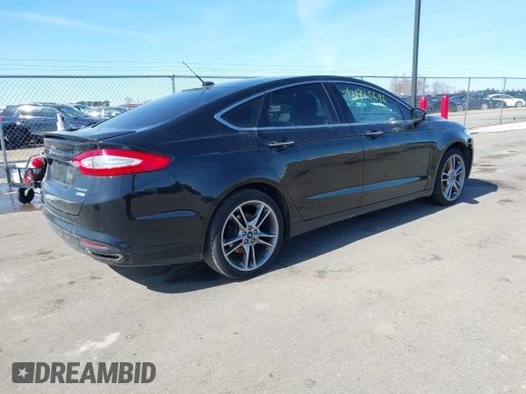 2016 Ford Fusion Titanium with VIN 3FA6P0K9XGR250007, listed as a IAAI auction lot 41775696 with 90,000 mi miles and . Bid and sale history available at DreamBid. Image 4.