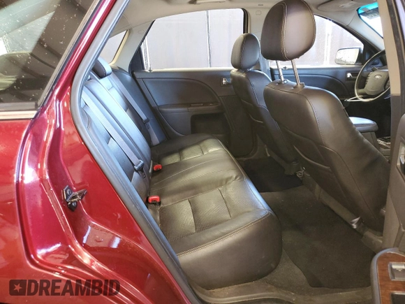 2008 Ford Taurus Limited with VIN 1FAHP28W08G187218, listed as a Copart auction lot 49624225 with 173,500 mi miles and Salvage title. Bid and sale history available at DreamBid. Image 10.